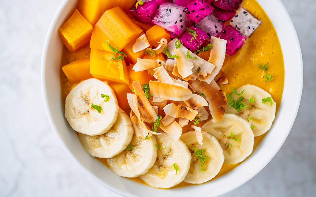 A tropical fruit blend with whipped cream